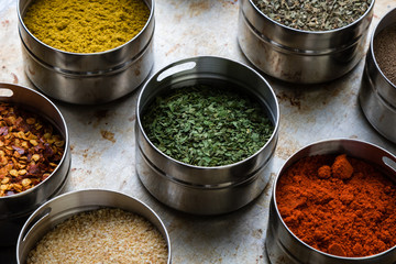spices in steel bowls