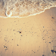 Sea summer abstract background. Golden sand beach with ocean waves. free space