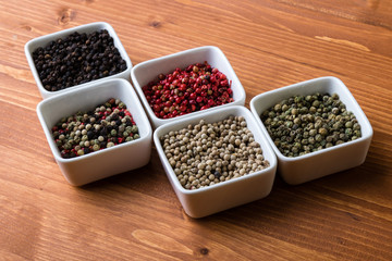 spices in white square bowls