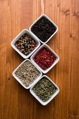 spices in white square bowls