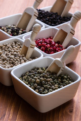spices in white square bowls