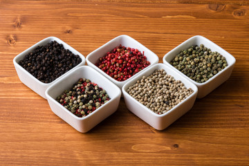 spices in white square bowls