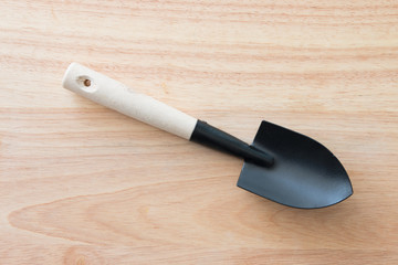 Gardening tools on a wooden board