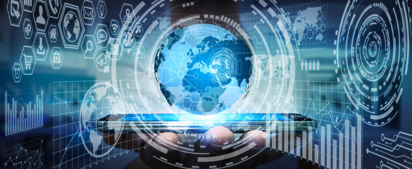 Businessman holding digital charts and globe