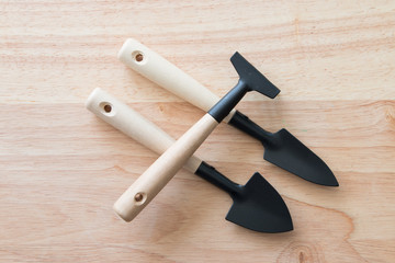 Gardening tools on a wooden board