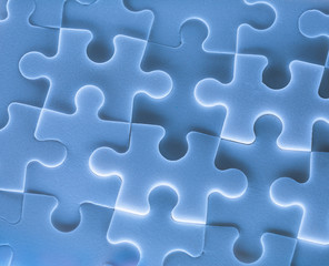 Jigsaw puzzle pieces as background