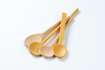 four wooden spoons