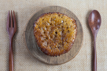 Banana cake with wooder spoon. .