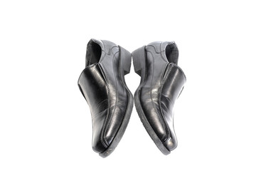 black leather shoes isolated on white background.