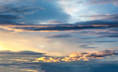 Naklejka na ściany i meble Blue sky with clouds before sunset