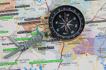 Closeup compass on Thailand map.