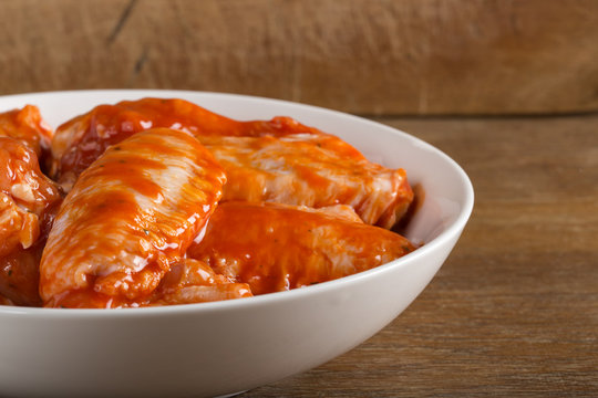 Chicken wings in marinade sauce