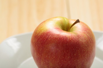 Apple on a white plate