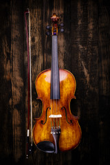 Fototapeta na wymiar Top view of violin and bow