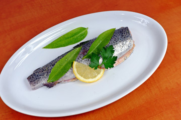 Trout with wild garlic, lovage and lemon