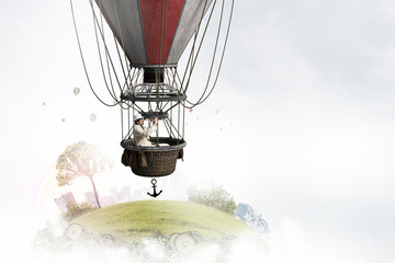 Elegant man traveling in aerostat