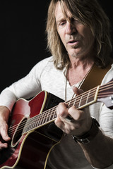 Obraz premium musician play guitar on studio