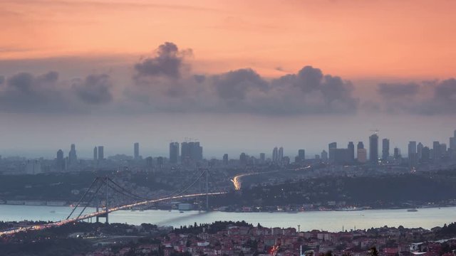 istanbul city skyline cityscape time lapse from day to night view of bosphorus bridge and financial business center