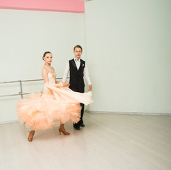 Dancing, ballroom dancing, dance studio, man and woman