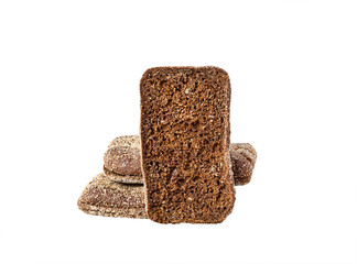 pieces of rye bread on white background, selective focus