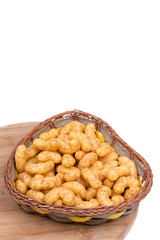 Macro closeup snacks with peanuts on a wooden board