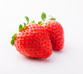 Strawberries group isolated on white