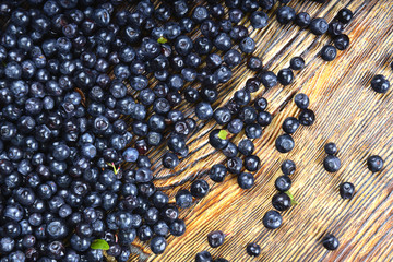 blackberries and blueberries on a wooden background