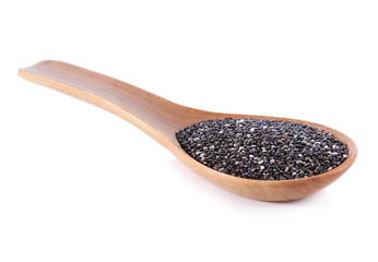 Nutritious chia seeds on a wooden spoon on white background