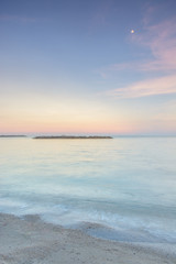 Fototapeta na wymiar Long exposure dramatic tropical sea and sky sunset(Un-focus imag