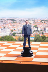 Businessman on the chess board