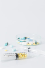 Tablets pills heap color mix therapy drugs doctor flu antibiotic