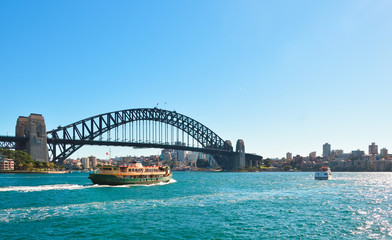 Obraz premium View of Harbour bridge with ferry boat, Sydney