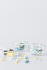 Obraz na płótnie Canvas Tablets pills heap color mix therapy drugs doctor flu antibiotic