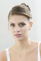 Naklejka premium Pretty face of cute young woman