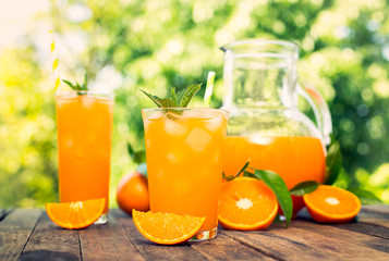 Orange juice in the glass with ice