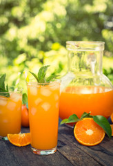 Orange juice in the glass with ice