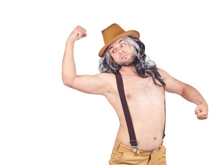 man in hat shows muscles.