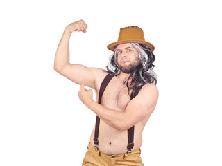 man in hat shows muscles.