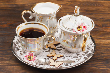 Tea set on the wooden background