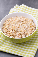 Oatmeal porridge with blueberries. healthy breakfast.