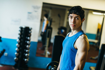 Young sportsman looking at camera