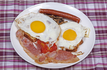Eggs and Bacon Breakfast on Checked Tablecloth