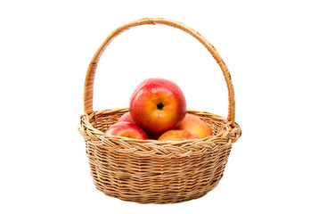 red apples in a basket isolated