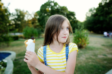 Kid girl don't want to share ice cream