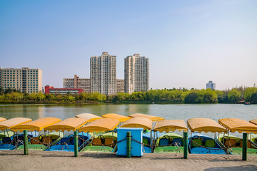 park with a lake and boats in Shanghai
