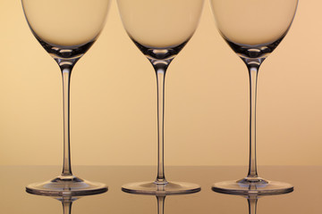 Three empty glasses of wine