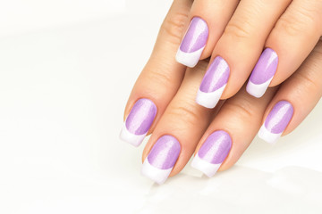 Woman hands with french manicure  close-up