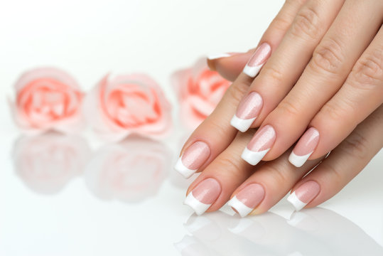Woman hands with french manicure  close up
