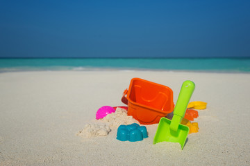 Fototapeta na wymiar Beach toys in the sand at the beach