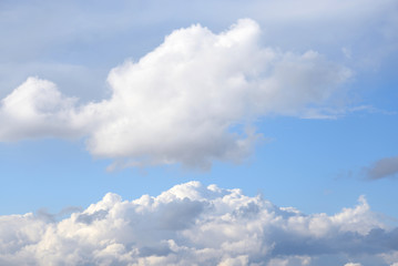 Naklejka na ściany i meble Blue sky with spindrift clouds.
